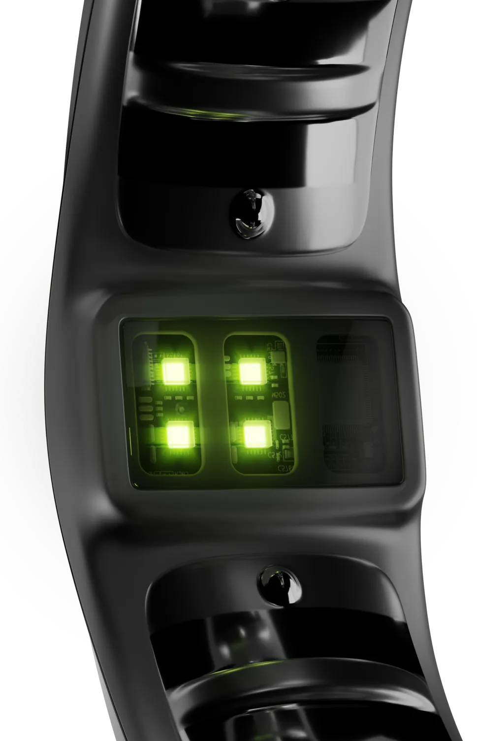 Close-up view of a smart ring underside, showing green LED lights on a black ring rim. The lights are illuminated, likely for heart rate monitoring or another sensor function. The background is black.